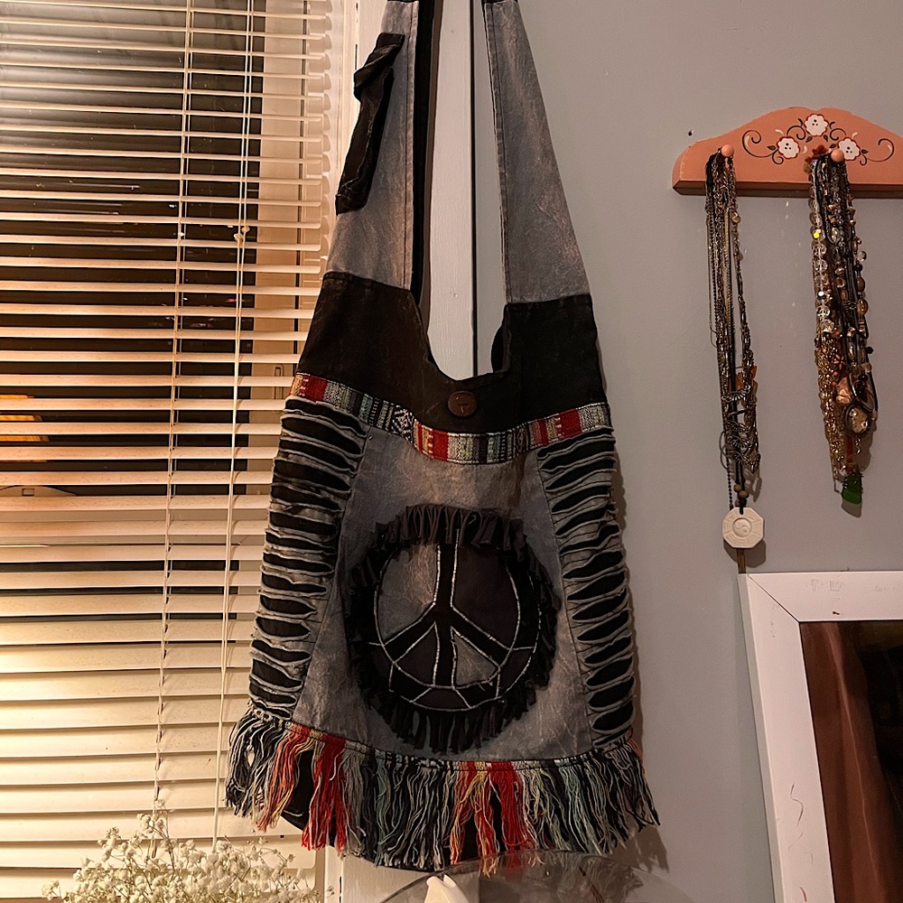 Peace sign cross body bag